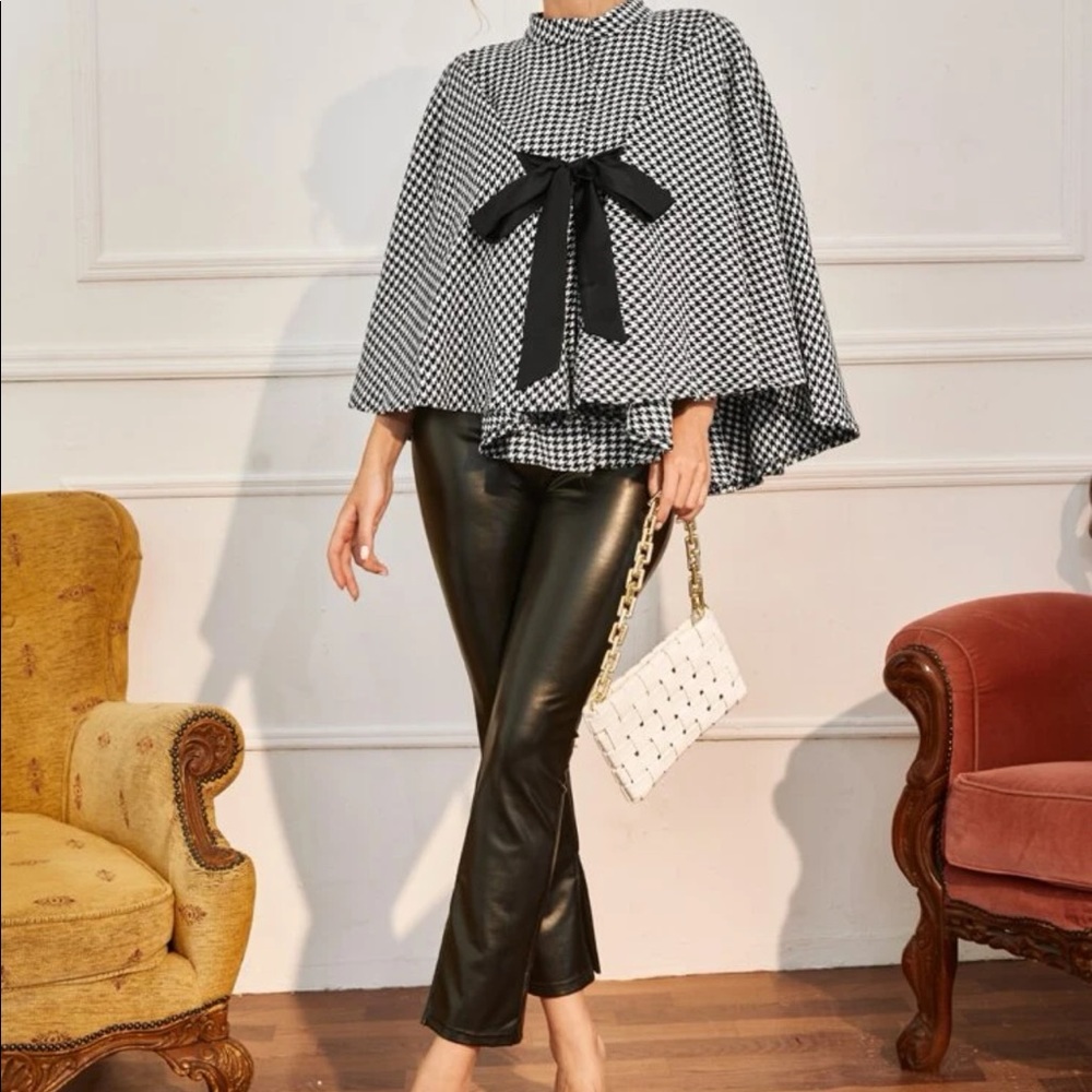 Beautiful woman cape overcoat